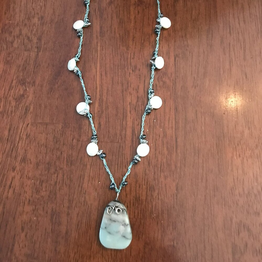 Turquoise pendant and shell bead necklace